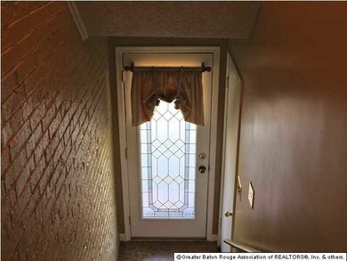 Leaded glass entry door on 1st floor