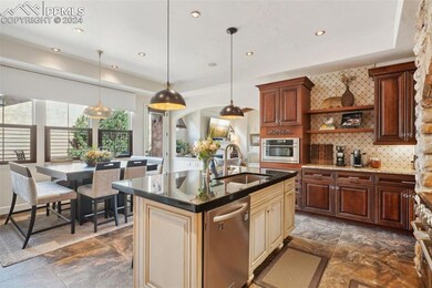 Kitchen with appliances with stainless steel finis