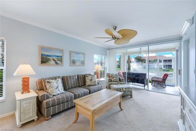 Living room featuring a wealth of natural light, l