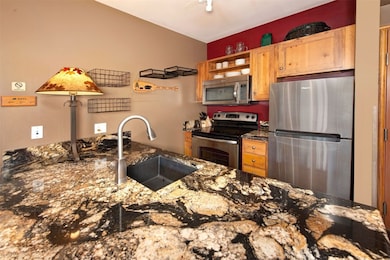 Kitchen featuring appliances with stainless steel