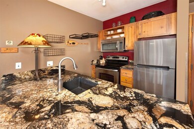 Kitchen featuring appliances with stainless steel