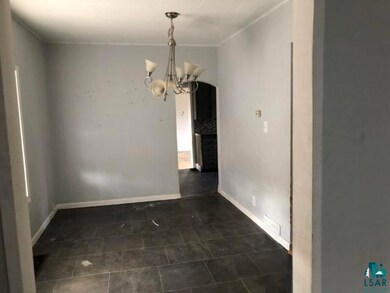 Unfurnished dining area featuring a notable chande