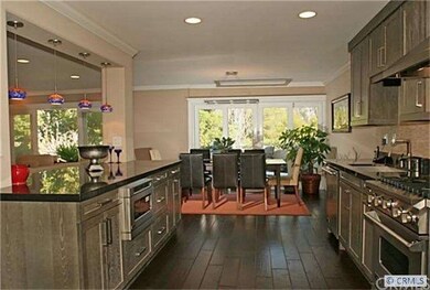 The kitchen boasts top-of-the-line Viking applianc