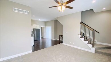 Main floor great room and eat-in kitchen.