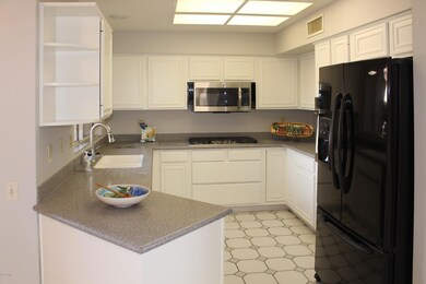 Kitchen with Corian Counters