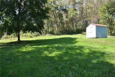 Nice and private rear yard includes shed.
