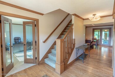 Beveled glass double doors to den