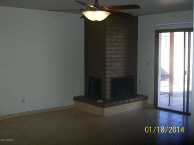Family room with Ceramic & fireplace.