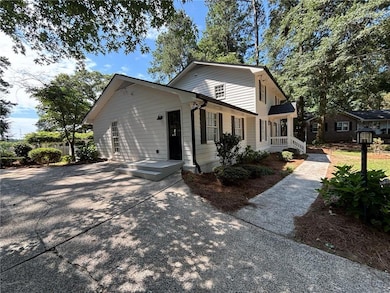 View of front of house featuring driveway