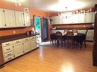 New flooring, countertops, and paint. Plenty of ro