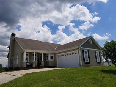 Well cared for home with lovely covered porch over