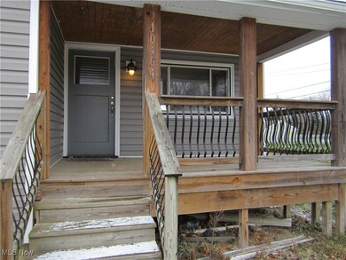 Property entrance with a porch