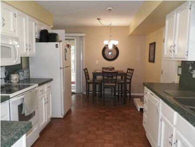 Hardwood floors in kitchen and dining