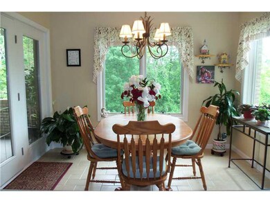 Kitchen. Breakfast area with french doors to cover