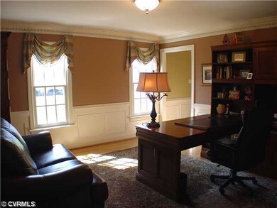 Living Room - Owners use this as office/Den