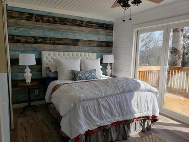 cozy master bedroom suite with lakeview!