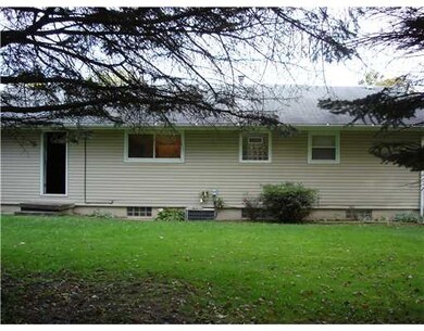 Exterior Back. recently vinyl sided