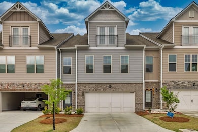 Townhome / multi-family property with an attached 