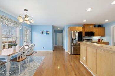 Living room opens to kitchen