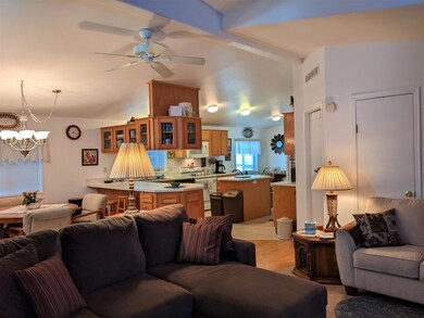 Living room looking into kitchen