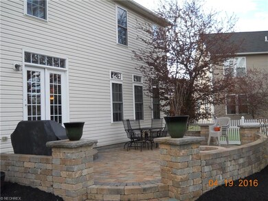 Wonderful rear stone patio with fire pit perfect f