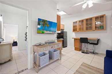 Living area with built in study area, baseboards, 