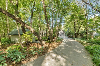 Hard to find 1-acre private wooded lakeshore lot!