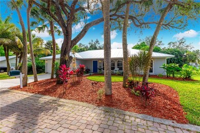 Brick paver street, nice mature trees on the lot,