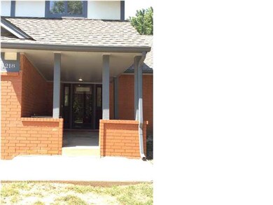 Covered porch and large foyer