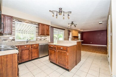 Vast, updated, eat-in kitchen with stainless appli