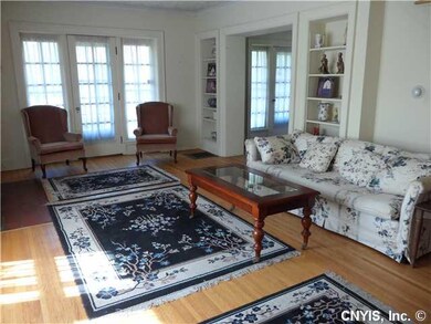 Living Room FRENCH GLASS DOORS LEAD TO FRONT PATIO