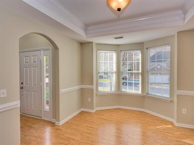 Formal Dining Room with Trey Ceiling and Bay windo