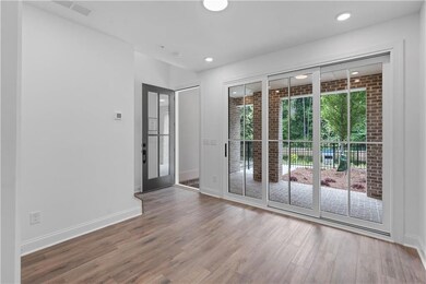 The slider door in the media room opens to the covered terrace patio offering an amazing indoor/outdoor space.