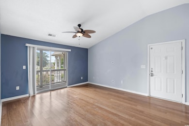 Unfurnished room with ceiling fan, hardwood / wood