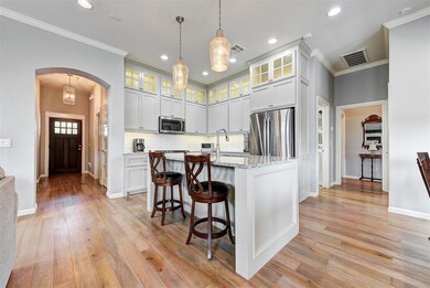 Can lights throughout the living, dining and kitch