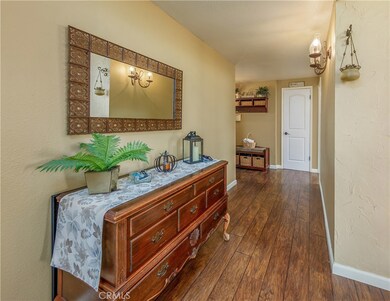 Beautiful flooring greets you.  High base boards, two panel doors and of course, scraped ceilings.