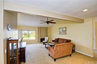 GREAT ROOM LOOKS OUT TO LARGE YARD AND VIEWS