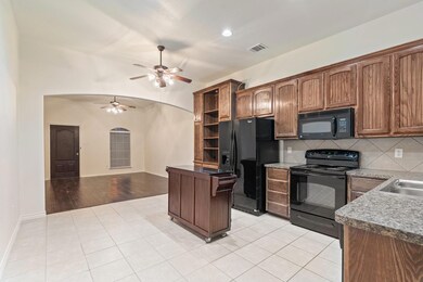 kitchen view into dining and living