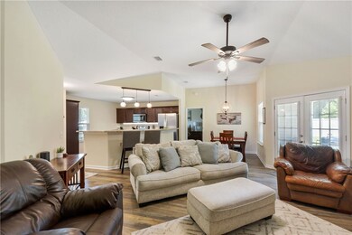 Family room looking toward front of home and kitch