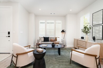 Living area *Photos and renderings are for representational purposes only are of a similar floor plan with differing finishes*