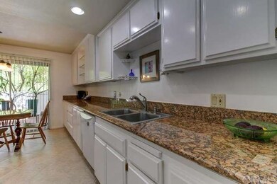 Kitchen has expanded cabinets and countertops.