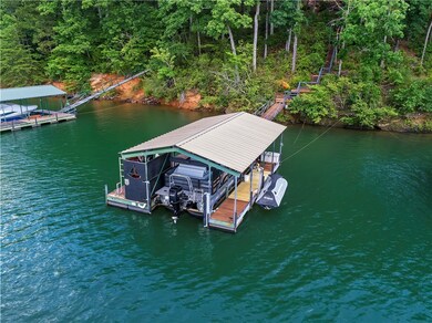 Covered slip dock with boat lift and pwc dock