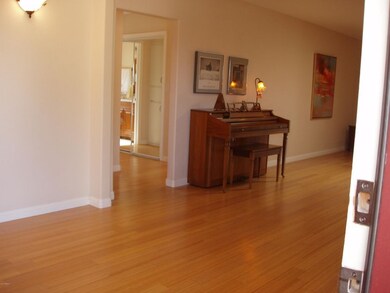 Entry toward Bath and Living Room