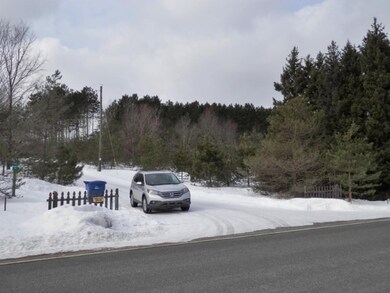 Entrance off paved Harlan Road