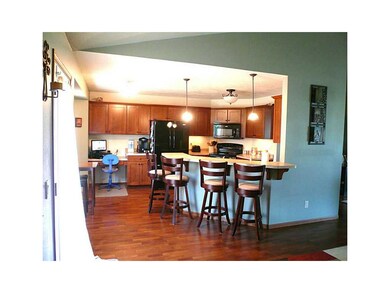 Kitchen. Loads of cabinets, desk area too!