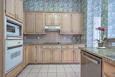 A stylish kitchen with plenty of cabinets, providi