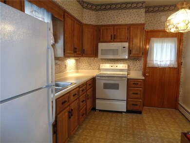The kitchen has ample cabinet space.