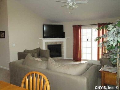 Living Room. Gas fireplace adds a touch of eleganc
