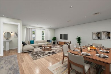 Virtually staged dining and living area.