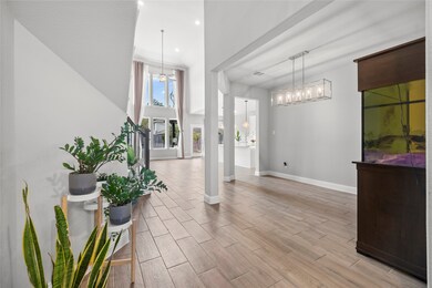 The first floor features a luxurious master bedroom, offering a serene retreat with ample space and comfort.